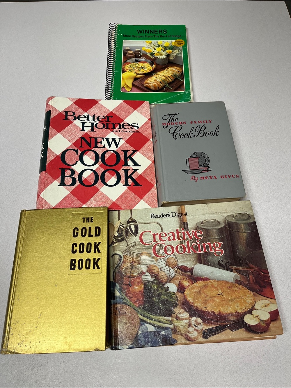 Vintage Cookbooks 
Gold, modern Family, Readers digest. Better Homes, bridge.